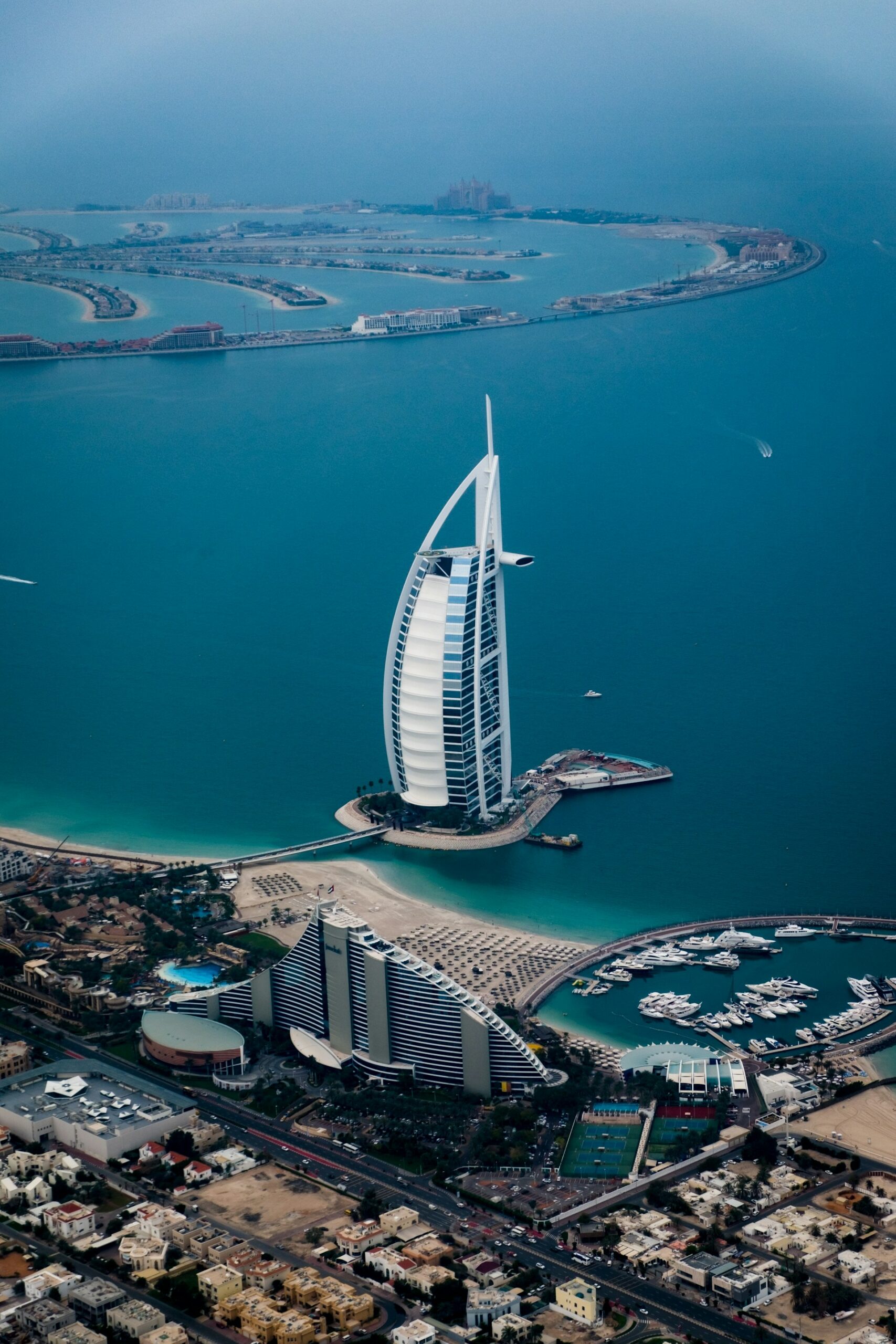Dubai city skyline at dusk with pink and purple tones